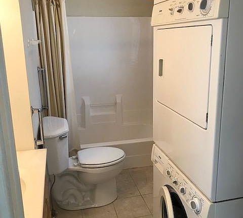 Main floor bathroom with stacked W/D.