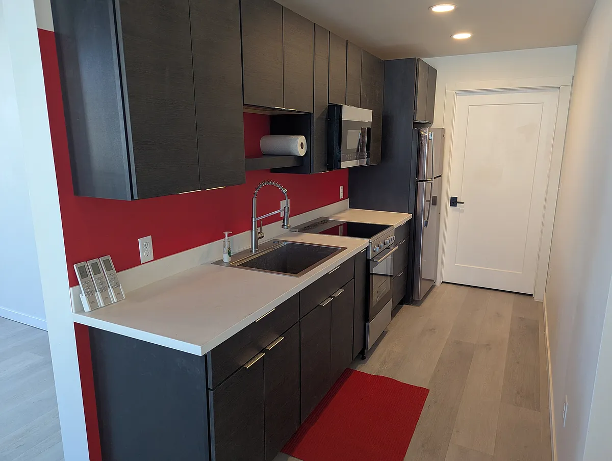 Compact kitchen with range, microwave and refrigerator - 847 Arizona Ave #102