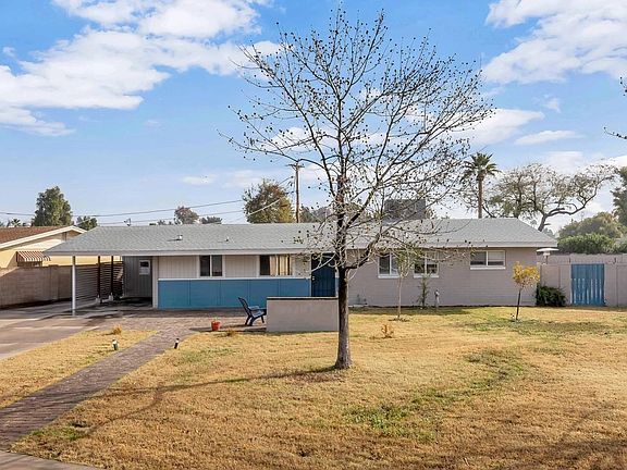 7501 N 16th Ln-large-002-1-Front Exterio