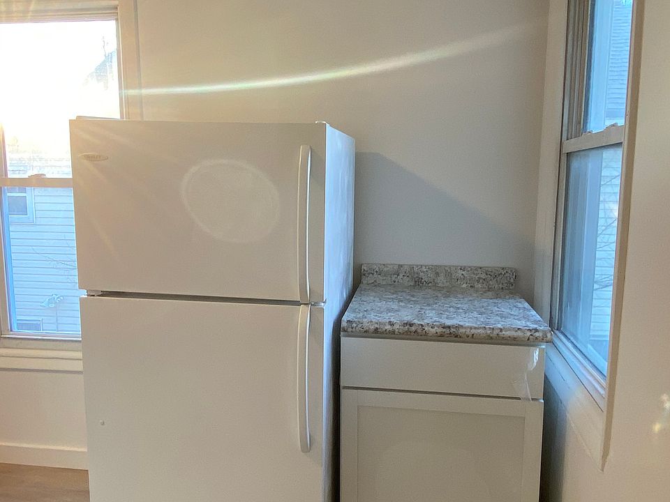 Kitchen with refrigerator