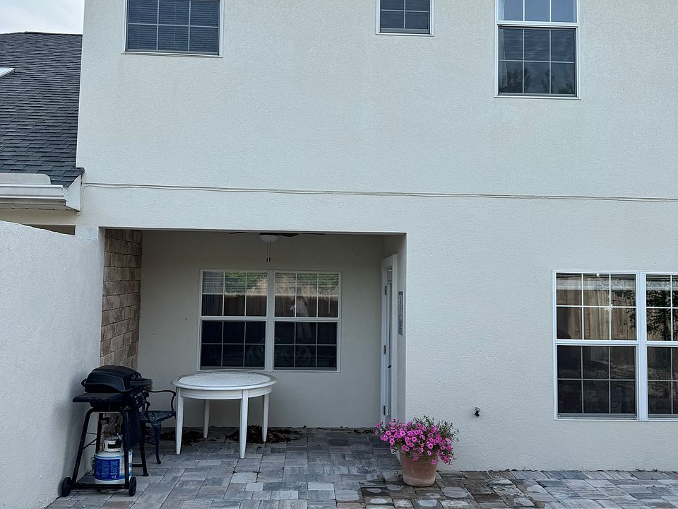 Backporch overhang area. Door leads to Front Room and Kitchen of Duplex.