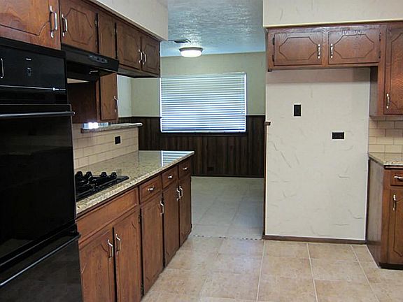 New Appliances. This view is looking into the breakfast room. The view out that window is stunning..