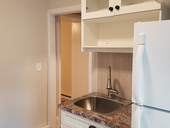 Kitchen sink with open shelf
