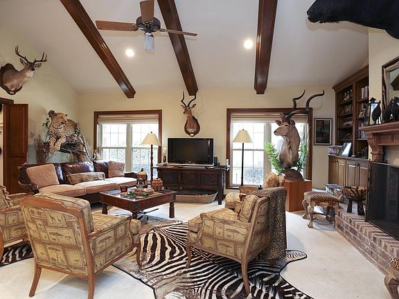 Family room with doors to kitchen and dry bar