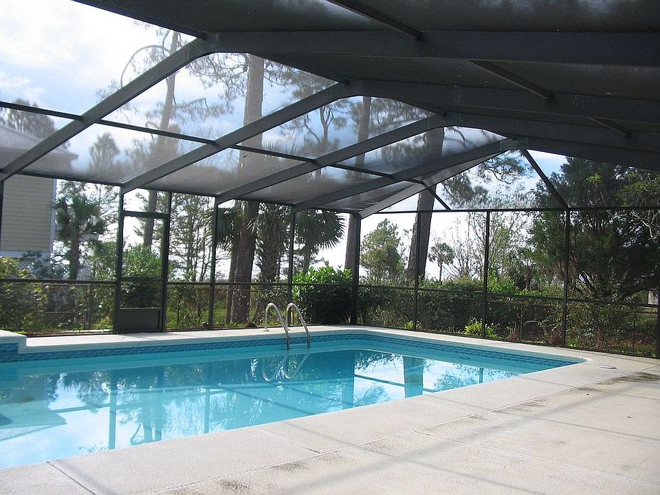 A 36x16 inground enclosed pool with spa