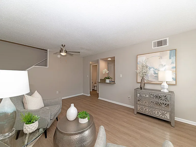 Spacious living room with hardwood-style flooring