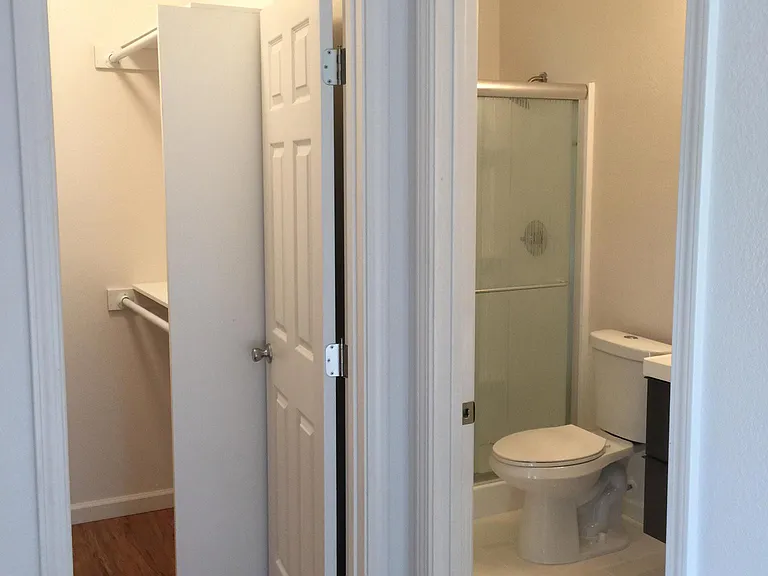 Extra storage space next to private bath.