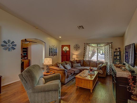 Spacious living room with wood floors
