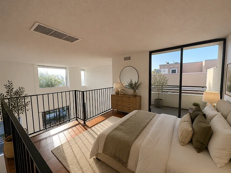 staged photo of loft as additional bedroom