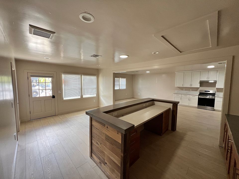 Huge common area has multiple large windows, a unique study bar, all new flooring and paint plus bonus storage cabinets.