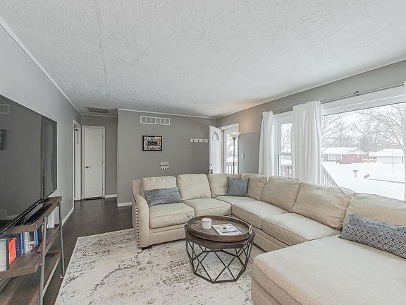 Family/living room is large and filled with natural light!