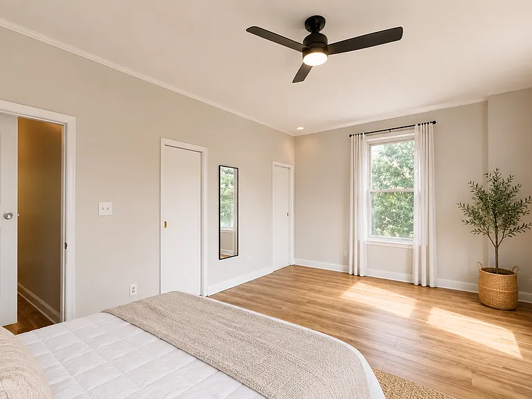 Master bedroom with small walk-in closet