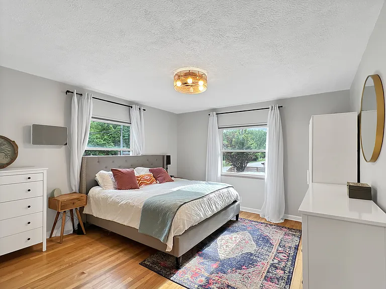 Spacious master bedroom with stylish ensuite bathroom.