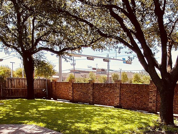 Side yard with trees & patio