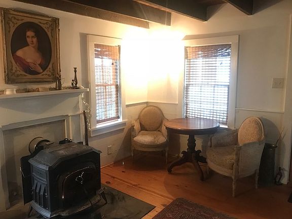 The first floor has a modern gas-fired Jotul stove in fully insulated space.