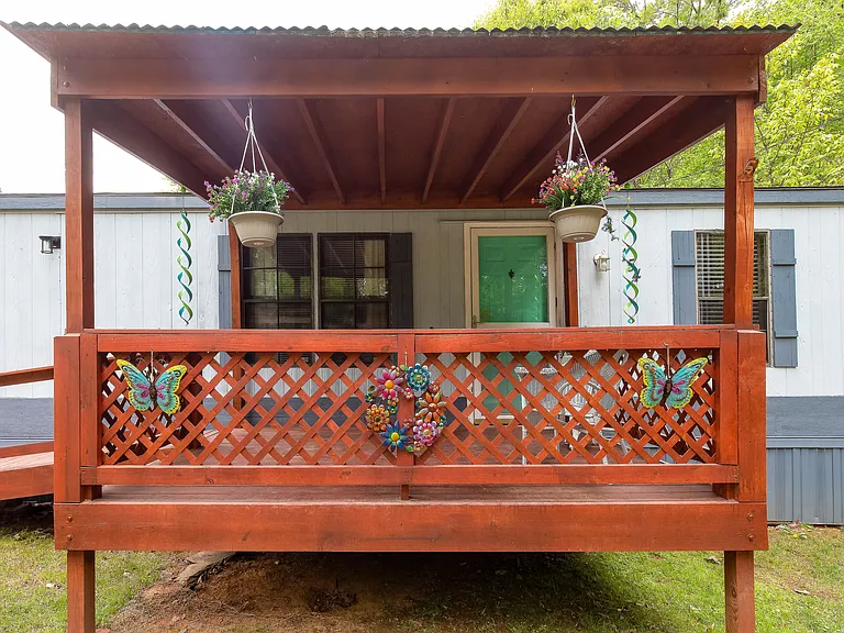 enjoy the shade on the deck in a very private neighborhood