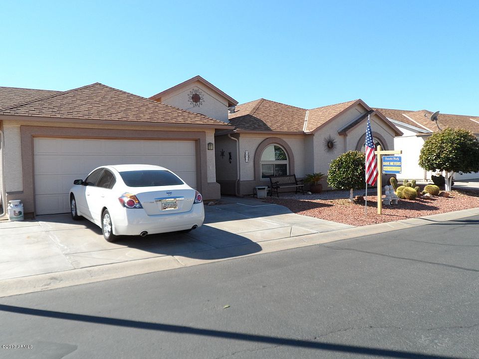 Front with 2 car garage