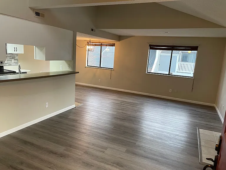 Living room with bar into kitchen