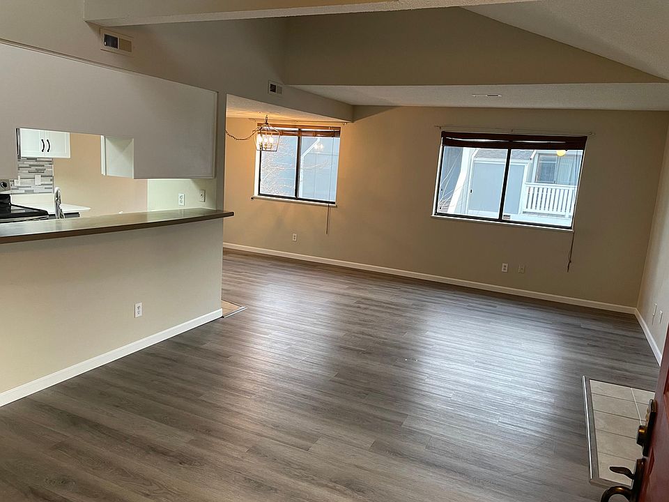 Living room with bar into kitchen