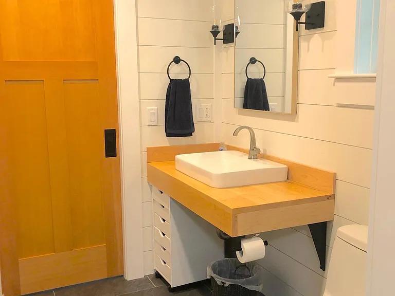 first floor bath, doors lead to hallway