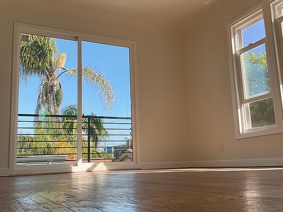 Light And Airy Bedroom with Lots of Windows