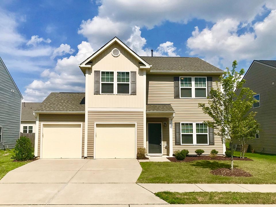 Front of Home - 2 Cary Garage, 2 Parking Spaces in Driveway