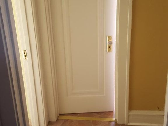 Hallway Leading To Primary Bathroom and Bedroom 2