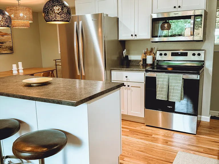 Kitchen with all updated appliances, including a brand new dishwasher