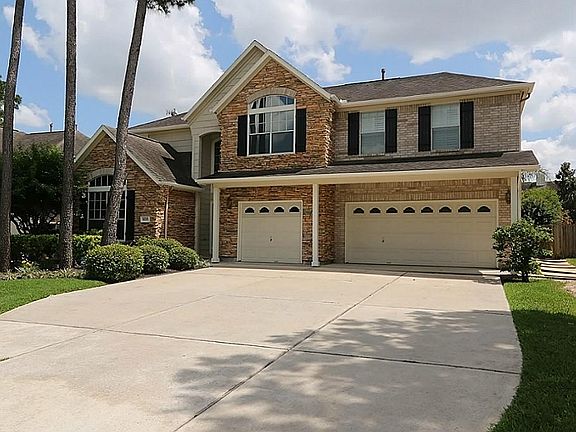 Front side view, plenty of parking.