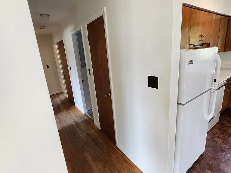Hall from Kitchen and Living room to Bedrooms and Bathroom