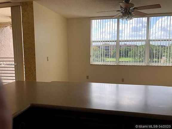 5th image of 9441 Live Oak Pl APT 409