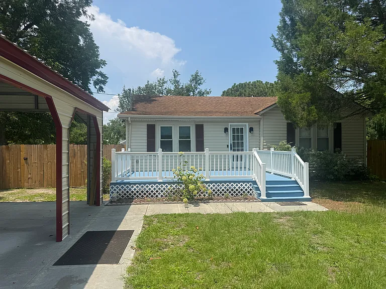 Carolina Blue Front Porch with covered parking