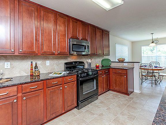 GRANITE KITCHEN WITH TILE BACKSPLASH & 42" CABINETS ~