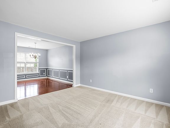 Formal living room , overlooking formal dining room