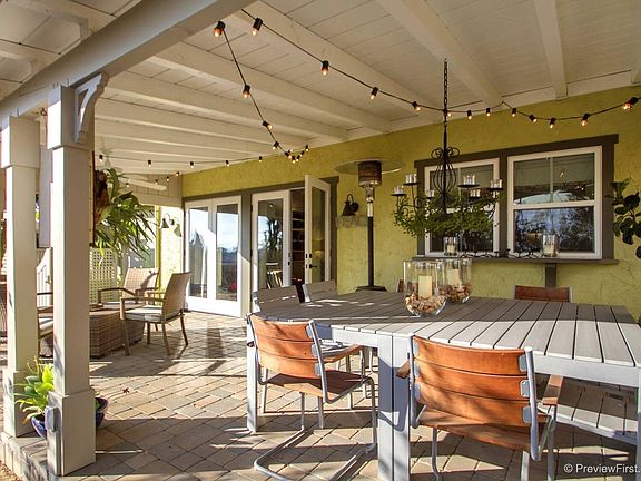 Back unit has a huge, covered outdoor dining area.