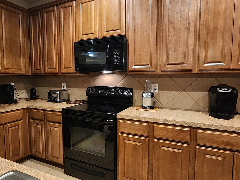 Fully Stocked Kitchen - dishes, bakeware, appliances, silverware, disposables, pots and pans