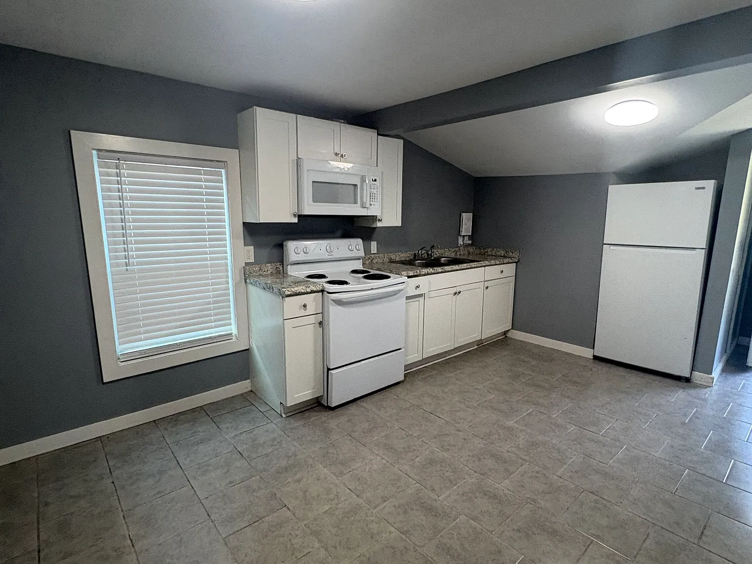 Updated 3BR Brunswick Home with Modern Kitchen & Easy-Care Flooring — Photo 2