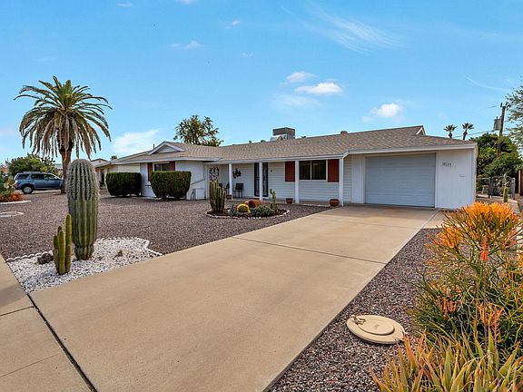 Single family home in a quiet neighborhood, tucked away within golf courses and recreation centers. Extended garage includes workbench and storage.