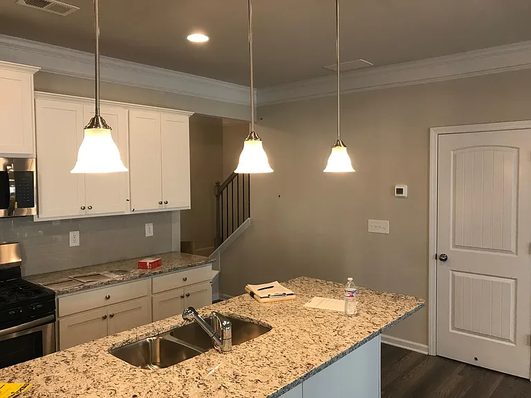 Kitchen with island - appliances are Gas