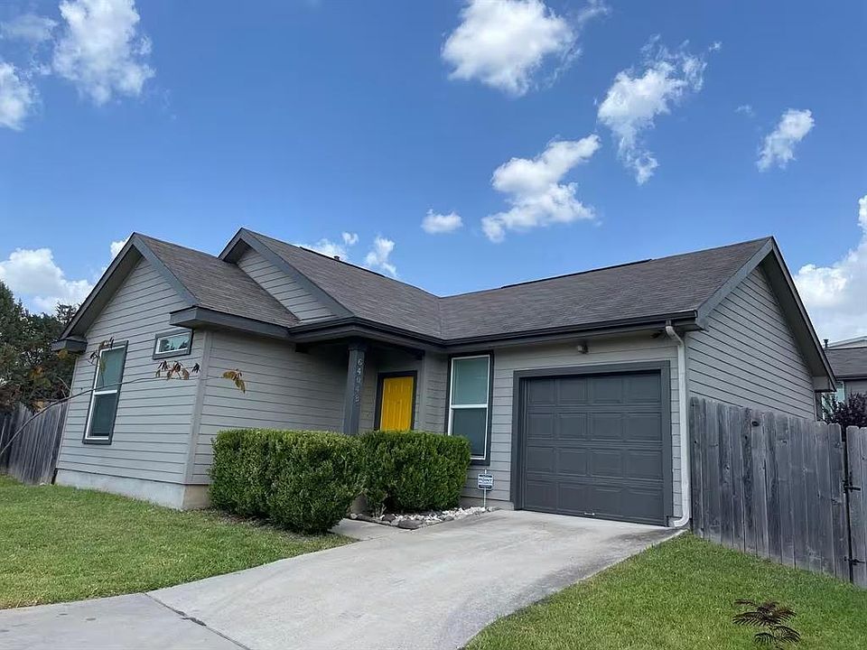 Quaint, newer construction home with private yard, 1 car garage and great layout.