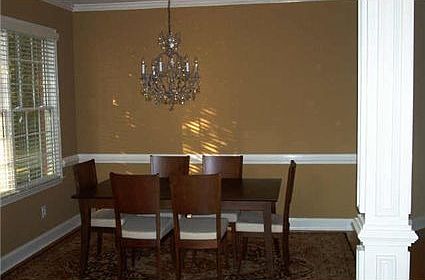 Large formal dining room with space for a larger table