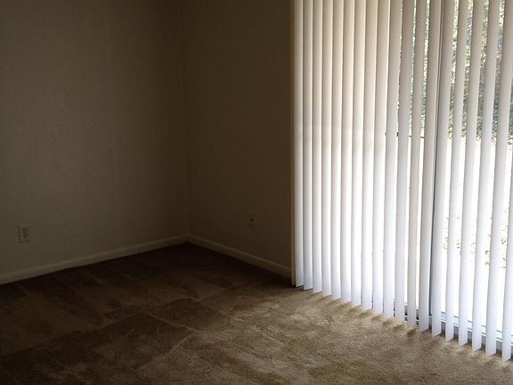 Living room with patio door to balcony.