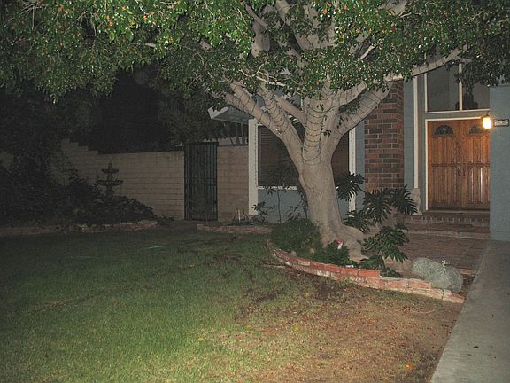 Front Yard with Gate to Addition