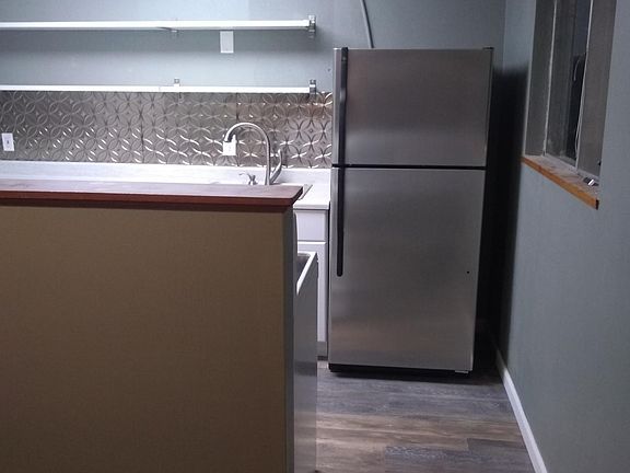 Bar separating kitchen from dining area.
