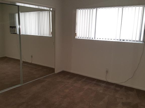 Master Bedroom looking towards closet and window