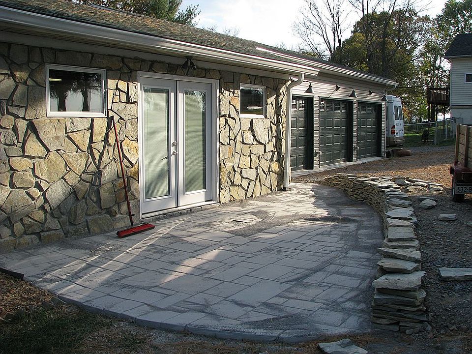 Patio in front of shop and 3 car oversize garage