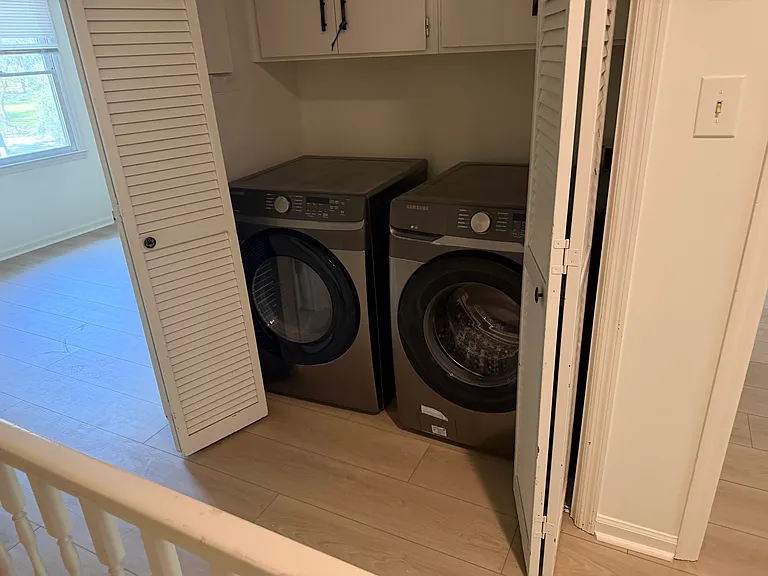 Washer & dryer upstairs near bedrooms