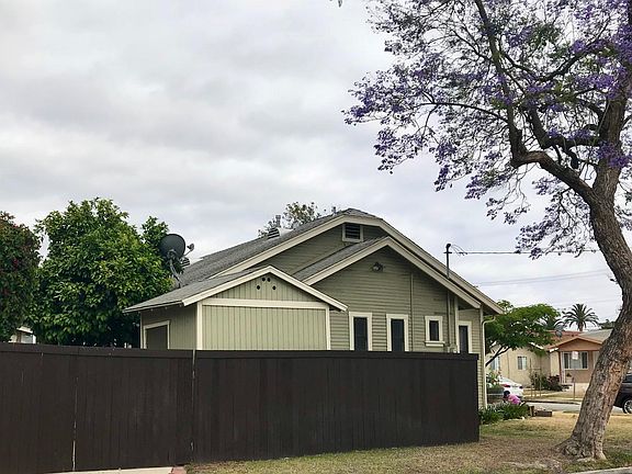 Side yard with gate entry, bonus storage area.