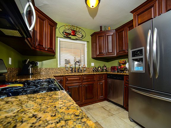4th image of 9509 S Denker Ave
