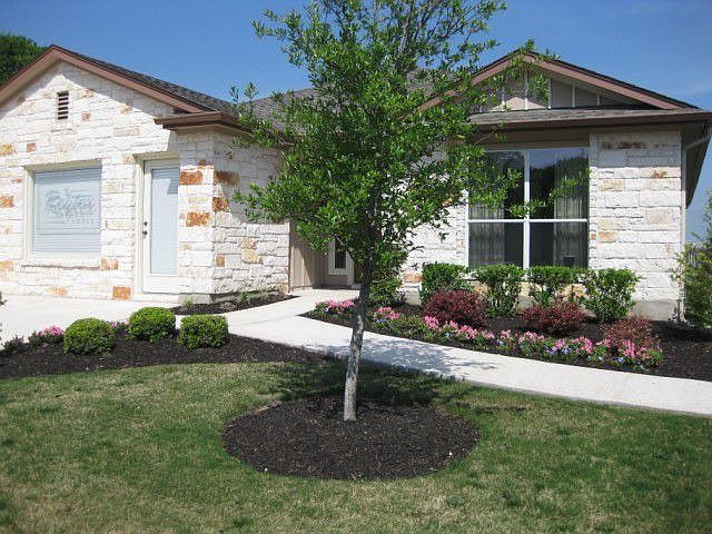 Fully landscaped with sprinkler system